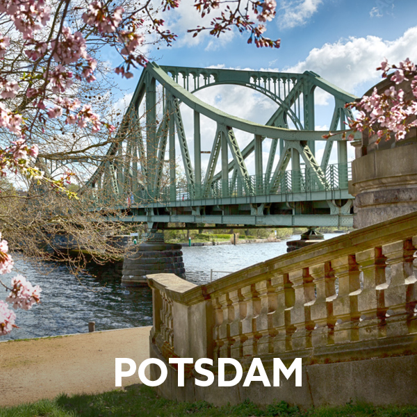The Glienicker Bridge in Potsdam and cherry blossoms